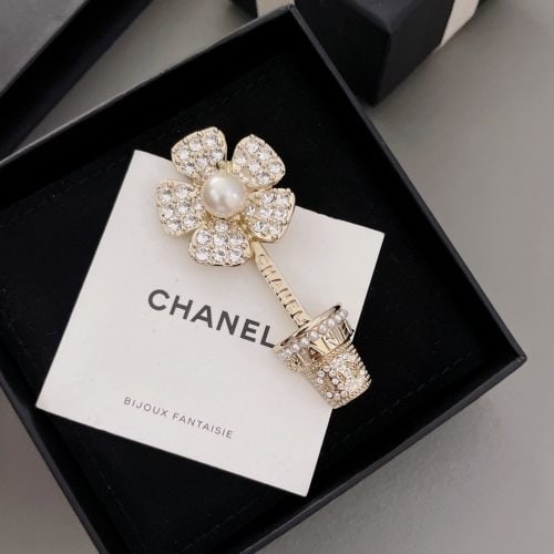 Ch brooch