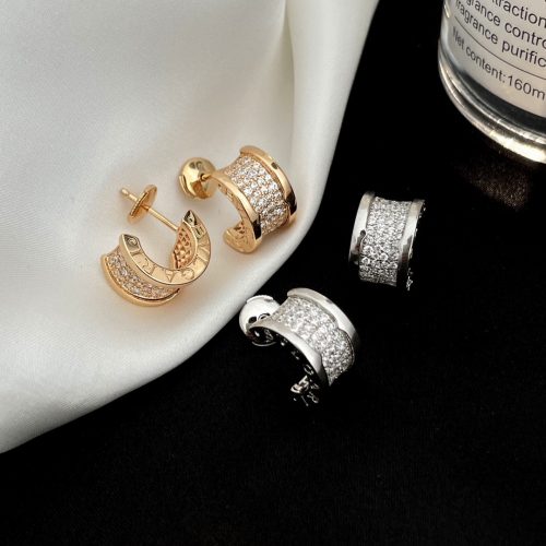 Ch stud earrings