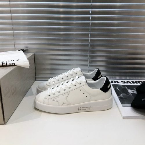 small white shoes in dirty shoes